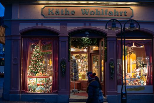 HEIDELBERG, GERMANY - FEBRUARY 2, 2013: The popular Käthe Wohlfahrt store in the centre of Heidelberg, Germany with its famous all year Christmas selection in the evening of February 2, 2013. Heidelberg is a well-known tourist attraction due to its old history and beautiful location at the Neckar river.