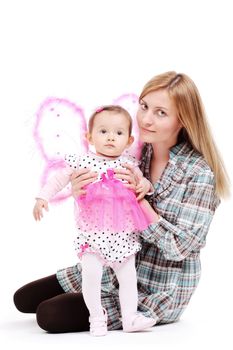 mother with her baby girl in pink butterfly outfit