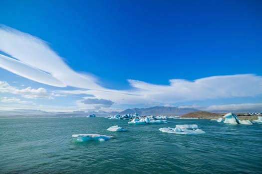 Icebergs in the glacier lake Jokulsarlon, glacier Vatnajokull, Iceland.