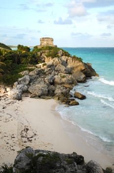 beautiful mayan ruin on cliff overlooking beach