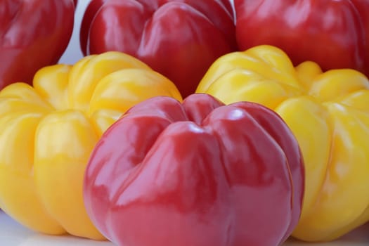 Image of red and yellow raw pepper
