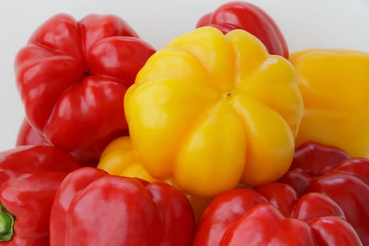Image of red and yellow raw pepper