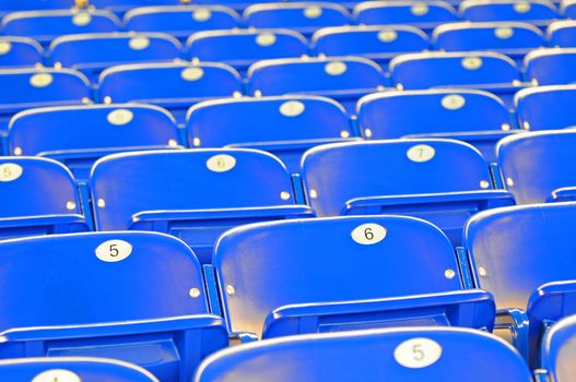 blue chairs and stadium seating