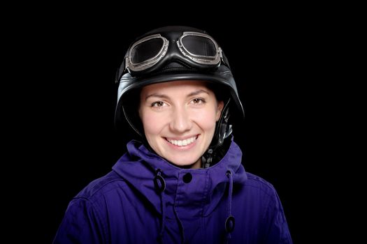 girl with us-army style helmet and goggles, on black