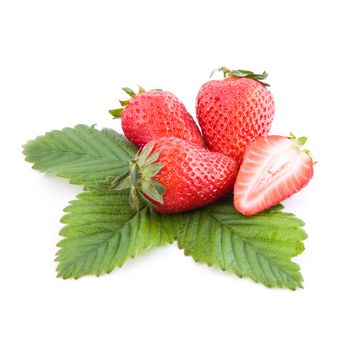 Fresh strawberries with leaf isolated on white