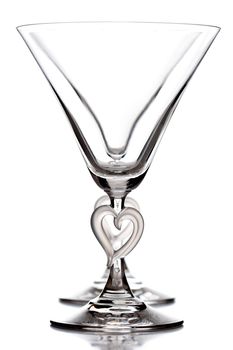 empty martini heart shaped glasses, isolated on white