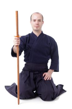 kendo fighter with bokken isolated on white