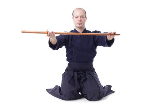 kendo fighter with bokken isolated on white