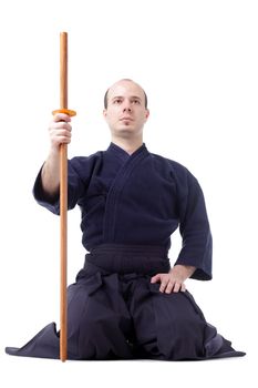 kendo fighter with bokken isolated on white