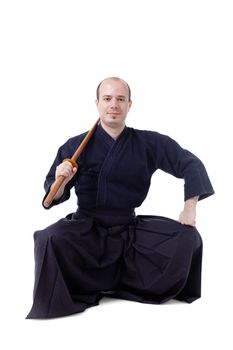 kendo fighter with bokken isolated on white