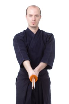 kendo fighter with bokken isolated on white