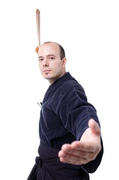 kendo fighter with bokken isolated on white