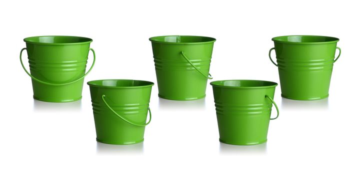 small green buckets isolated on white background