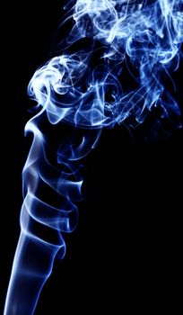 abstract blue smoke against black background