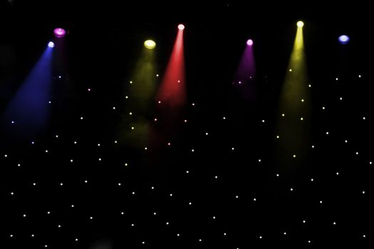 abstract mucis stage with multicolored lighting