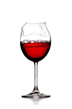 red wine in broken glass, isolated on white