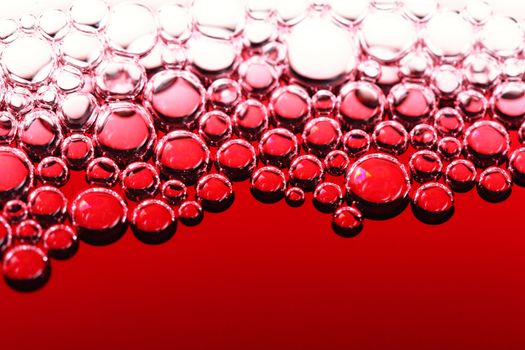 abstract red wine bubbles, close up shot
