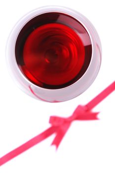 red wine glass with a ribbon bow