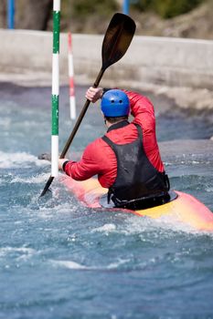 kayaker manoeuvring in white water