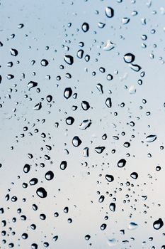 rain drops on a window, close up photo