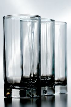 three empty crystal glasses