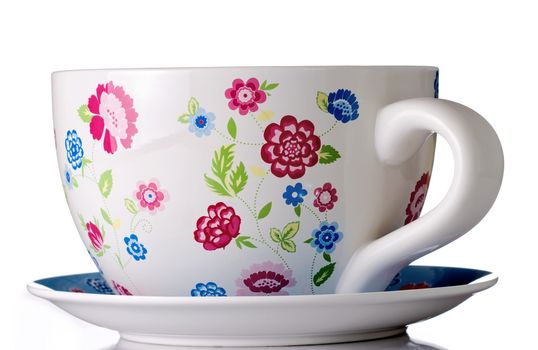 huge coffee or tea cup with flowers decoration