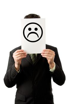 Businesman is holding a sad smilie