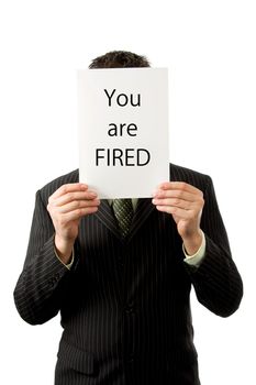 businessman is holding a text board: You are fired!