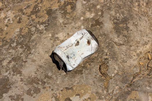 Old tin can lying on the floor