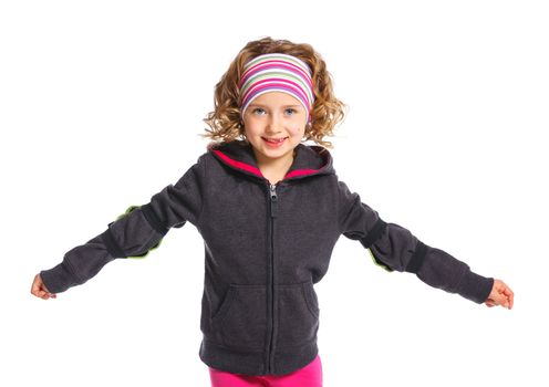 Cute girl wearing in sports clothes. Isolated on a white background