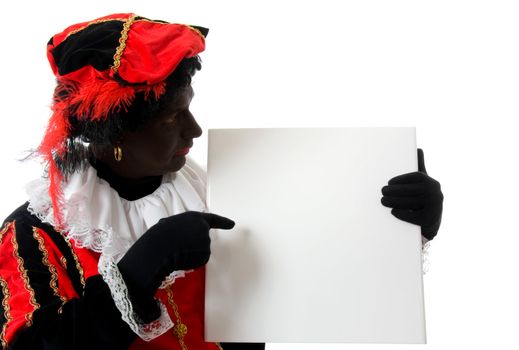 Zwarte piet ( black pete) typical Dutch character part of a traditional event celebrating the birthday of  Sinterklaas in december over white background is holding empty text board