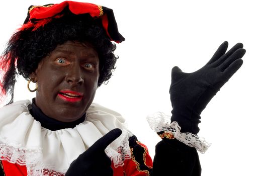 Zwarte piet ( black pete) typical Dutch character part of a traditional event celebrating the birthday of  Sinterklaas in december over white background