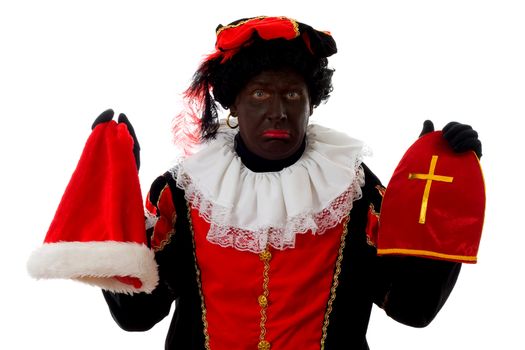 Zwarte piet ( black pete) typical Dutch character part of a traditional event celebrating the birthday of  Sinterklaas in december over white background holding Santa's hat