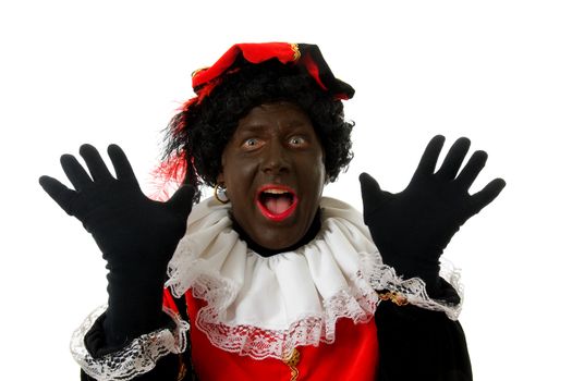 surprised Zwarte piet ( black pete) typical Dutch character part of a traditional event celebrating the birthday of  Sinterklaas in december over white background