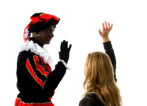 Blonde girl waves goodbye to Zwarte piet ( black pete) typical Dutch character part of a traditional event celebrating the birthday of  Sinterklaas in december over white background