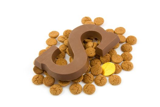 Chocolate letter S and ginger nuts for Sinterklaas, event in the Dutch in december, over white background