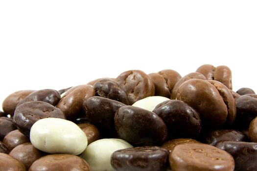 chocolate gingernuts, pepernoten, in closeup. Tyical Dutch candy for 5 december.