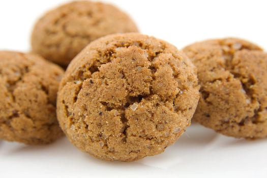 pile of pepernoten (ginger nuts) in closeup, sweets for typical Dutch festivity at 5 december
