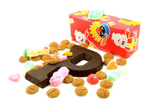 Typical Dutch event: Sinterklaas in december with present and candy over white background