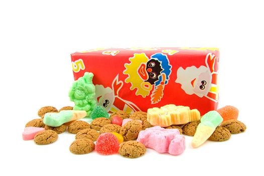 Typical dutch sweets: pepernoten (ginger nuts) and present for a celebration at 5 december in the Netherlands