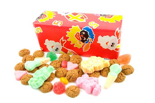 Typical dutch sweets: pepernoten (ginger nuts) and present for a celebration at 5 december in the Netherlands