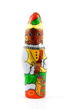 Chocolate black pete ( zwarte piet), candy for a tradiotional event in the Netherlands, over white background