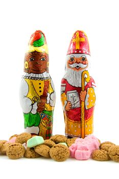 Chocolate black pete ( zwarte piet) and sinterklaas ( santa claus), candy for a tradiotional event in the Netherlands, over white background