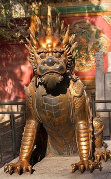 Dragon Bronze Statue With Hand on Ball Gugong, Forbidden City Emperor's Palace Built in the 1400s in the Ming Dynasty

Resubmit--In response to comments from reviewer have further processed image to reduce noise, sharpen focus and adjust lighting.