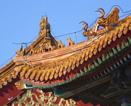 Roofs Figurines Gugong, Forbidden City Decorations Emperor's Palace Built in the 1600s in the Ming Dynasty

Resubmit--In response to comments from reviewer have further processed image to reduce noise, sharpen focus and adjust lighting.