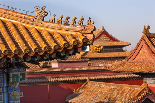 Roof Figurines "Bitter End" Yellow Roofs Gugong, Forbidden City Roof Figures Decorations Emperor's Palace Built in the 1400s in the Ming Dynasty

Resubmit--In response to comments from reviewer have further processed image to reduce noise, sharpen focus and adjust lighting.
