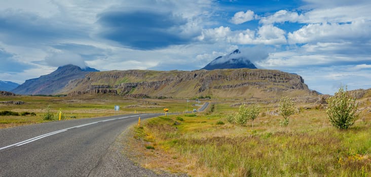 Winding road bends of Thingvellir - famous area in Iceland. Panorama