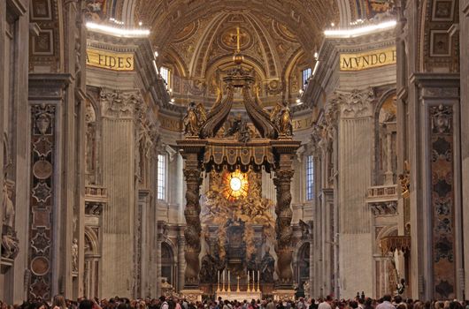 A wide angle shot of the main altar of St. Peter's Basilica, in Rome, Italy.
