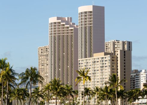 Exterior of modern hotel buildings on sea front of Waikiki Oahu Hawaii
