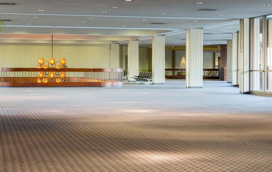 Empty space with no passengers in modern airport departure lounge hall
